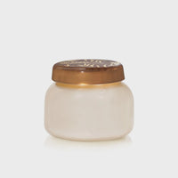 Small round jar of cream with decorative bronze lid from Capri Blue Volcano collection