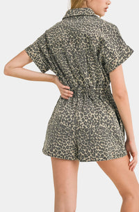 Short-sleeved leopard print romper with belted waist from Shop Daisy, perfect for women’s boho chic clothing