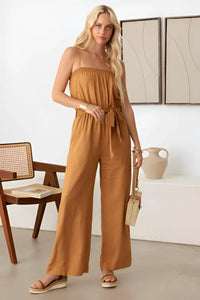 Strapless mustard Tie Waist Linen jumpsuit with boho smocked neck line and flowy legs