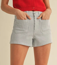 High rise denim shorts with patch pockets for a stylish summer look