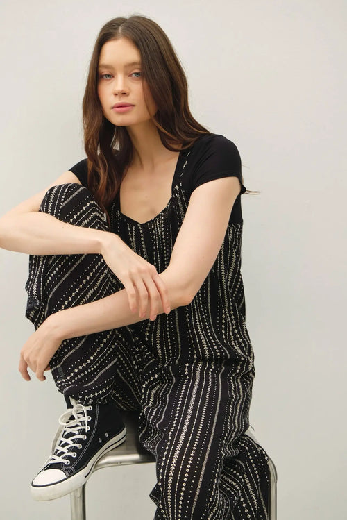 Printed breezy wide leg womens boho chic clothing jumpsuit with striped pattern and sneakers