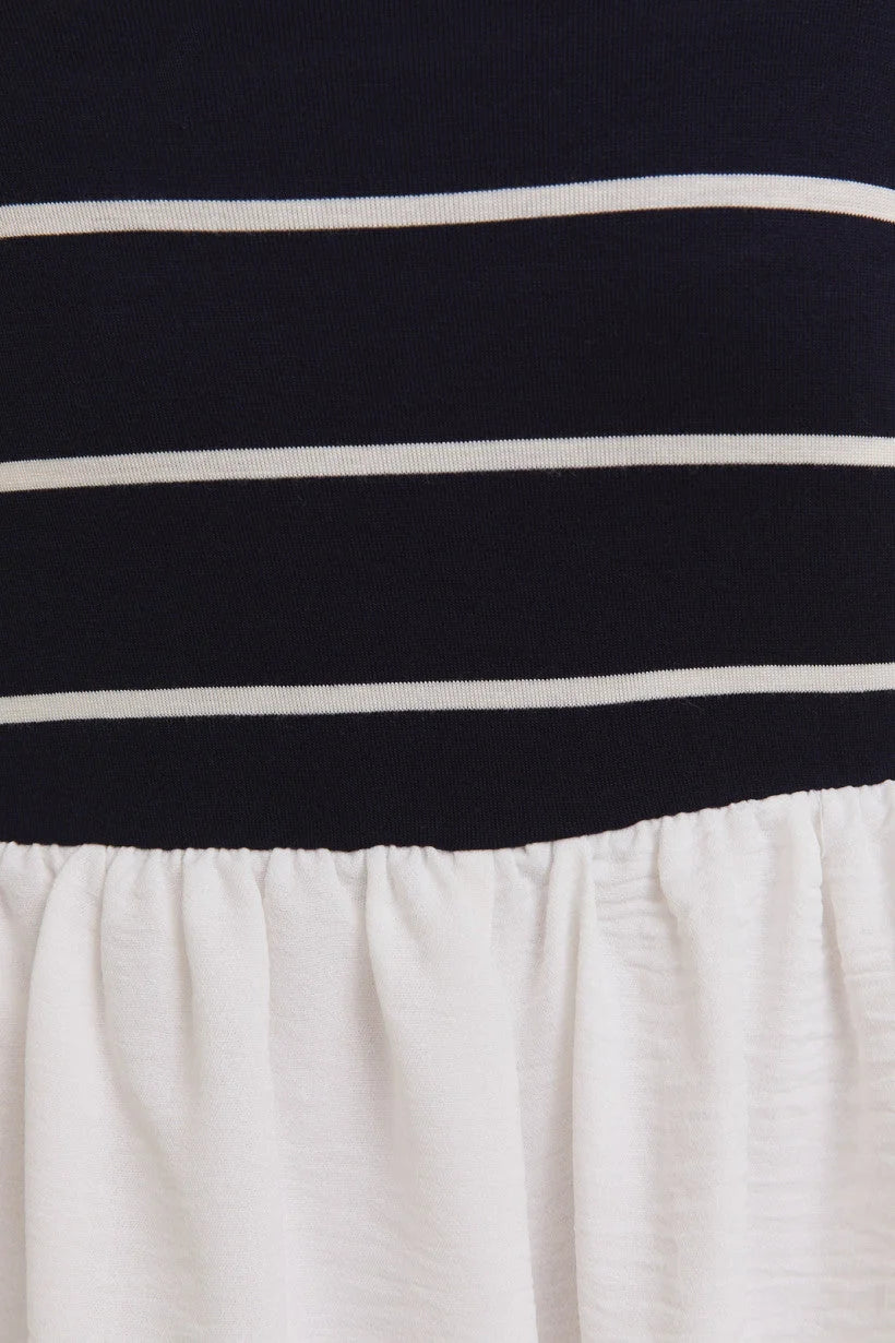 Striped navy and white fabric with gathered white material on woven shorts mix romper