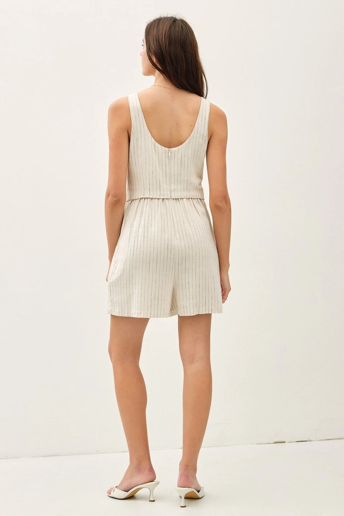 Striped vest romper with a cinched waist from Shop Daisy, perfect for women’s boho chic clothing