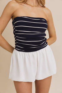 Woven shorts mix romper featuring a tube stripe strapless top and white shorts