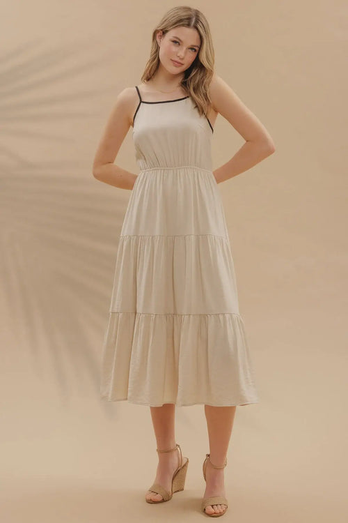 Beige tiered midi dress showcasing womenās boho chic clothing in shop Daisy collection