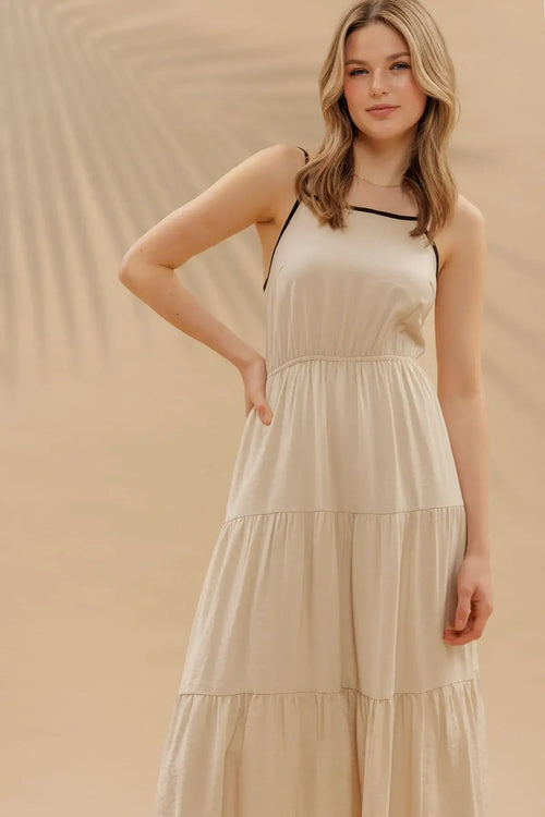 Beige tiered midi dress showcasing womenās boho chic clothing at Shop Daisy