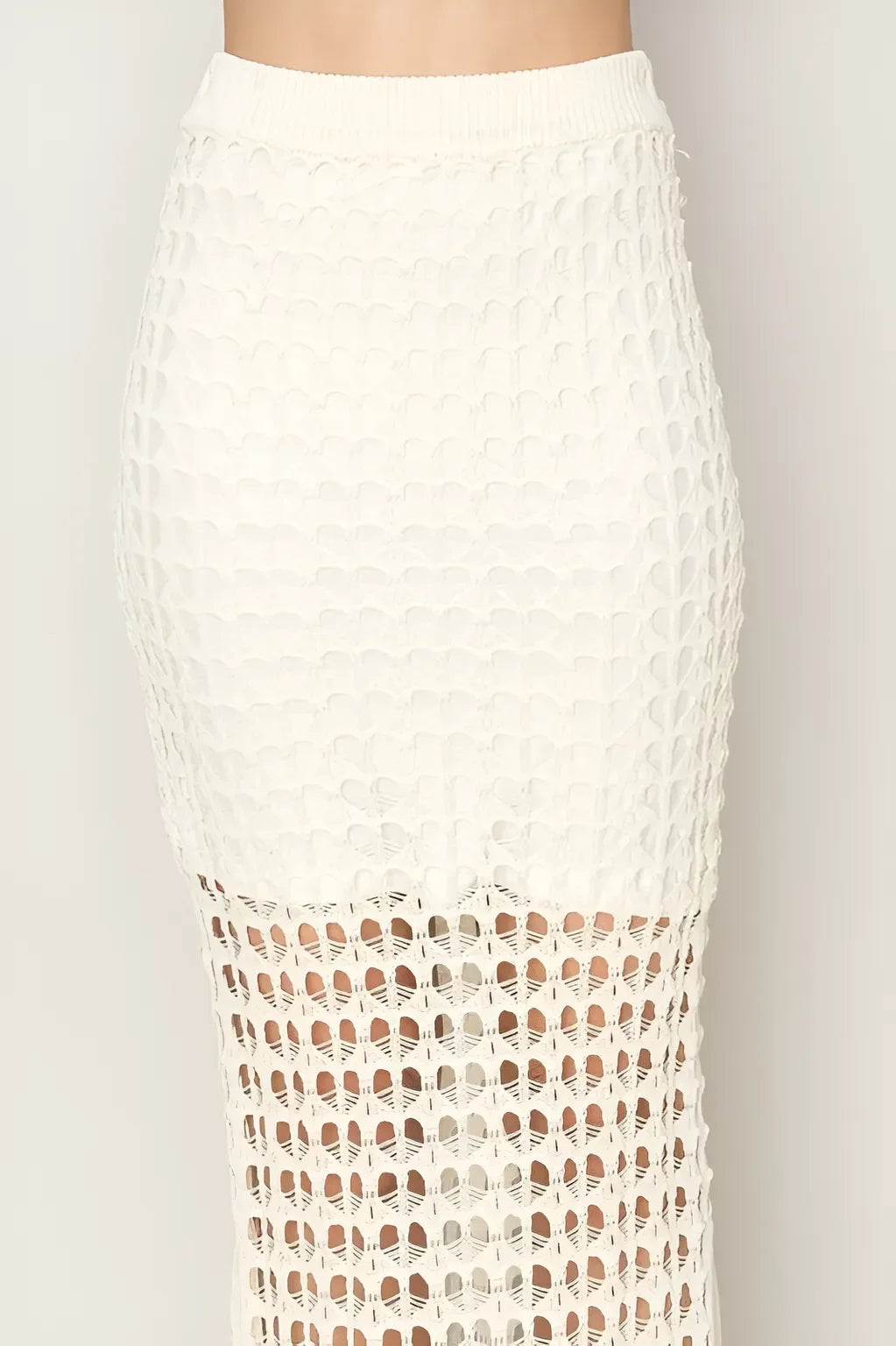White crochet maxi skirt with sheer lattice pattern for a flowy boho vibe