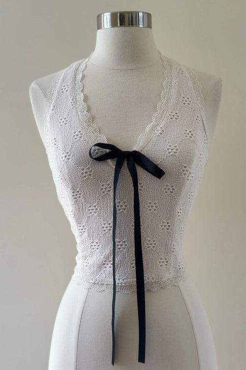 White lace trim eyelet halter top with black ribbon tie for elegant summer wear