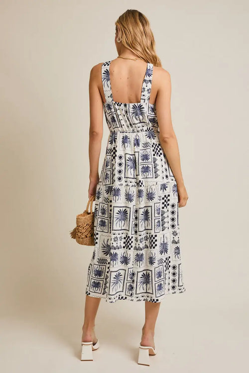 White halter neck abstract print dress with stylish pattern and elegant design