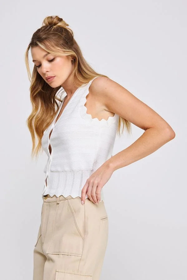 White pointelle knit button vest with scallop edges for a stylish layered look