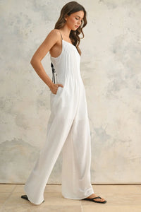 White wide-leg jumpsuit with contrast strap and spaghetti straps from BOHO ME JUMPSUIT collection