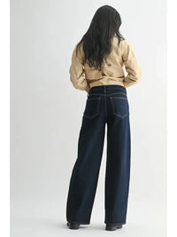 High-rise full length straight denim jeans with wide legs and button fly