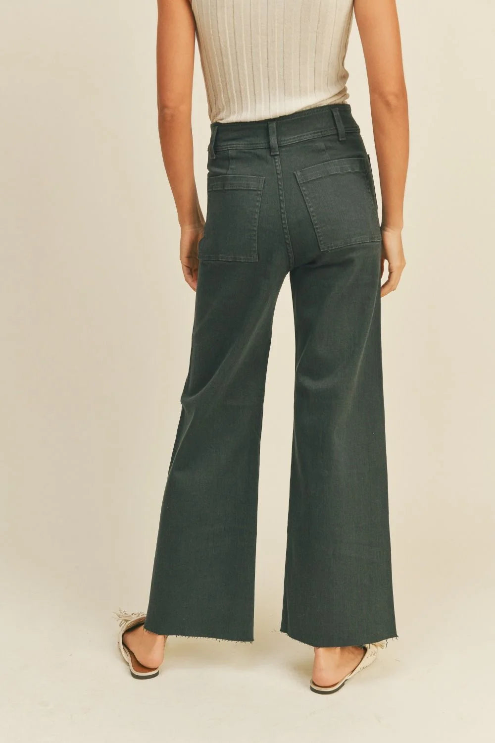 Stylish wide leg dark green denim pants with front pockets from Daisy Lane