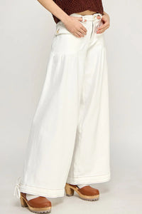 Wide-leg white pants from LOTUS STRETCH JEANS, ideal for women’s boho chic clothing