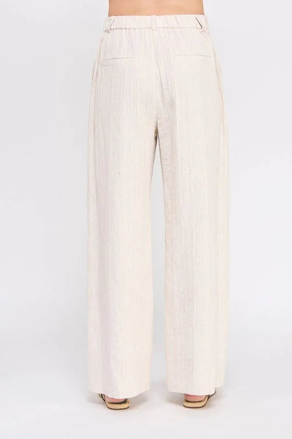 Wide-legged beige trousers from TEXTURED WIDE LEG PANTS BACK ELASTIC WAIST collection