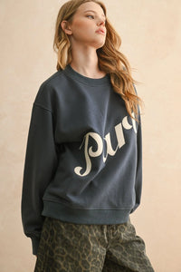 Women’s boho chic clothing Paris Patch front sweatshirt with cursive logo and dark shorts
