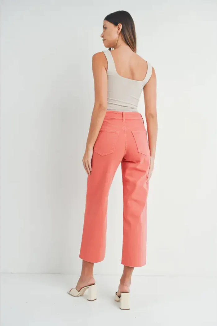 Woman wearing a tank top and coral pants in Nautical Wide Leg Denim style