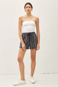 Woman in white tube top and cotton blend striped shorts showcasing Breezy Cotton Blend Striped Shorts