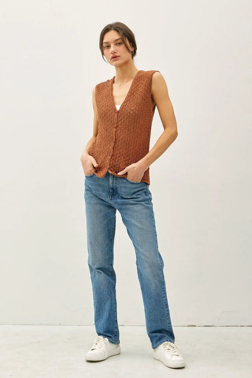 Womanās brown knit vest and blue jeans outfit, ideal for womenās boho chic clothing from Shop Daisy