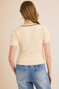 Woman’s cream cable-knit tie cable sweater with square neck puff half sleeve design