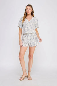 Woman wearing a seashell printed linen elastic tie two-piece outfit