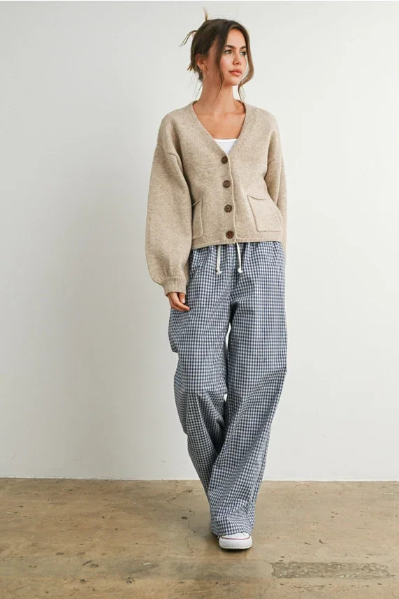 Women’s beige V neck cuff button-up long sleeve cardigan with front pockets