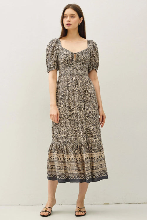 Womenās black and beige paisley border print midi dress with puff sleeves and ruffled hem