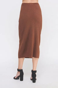 Women’s soft lurex tube midi skirt with black ankle-strap heels for elegant style