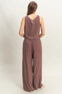 Women’s brown sleeveless jumpsuit with wide cut, perfect for women’s boho chic clothing from Shop Daisy