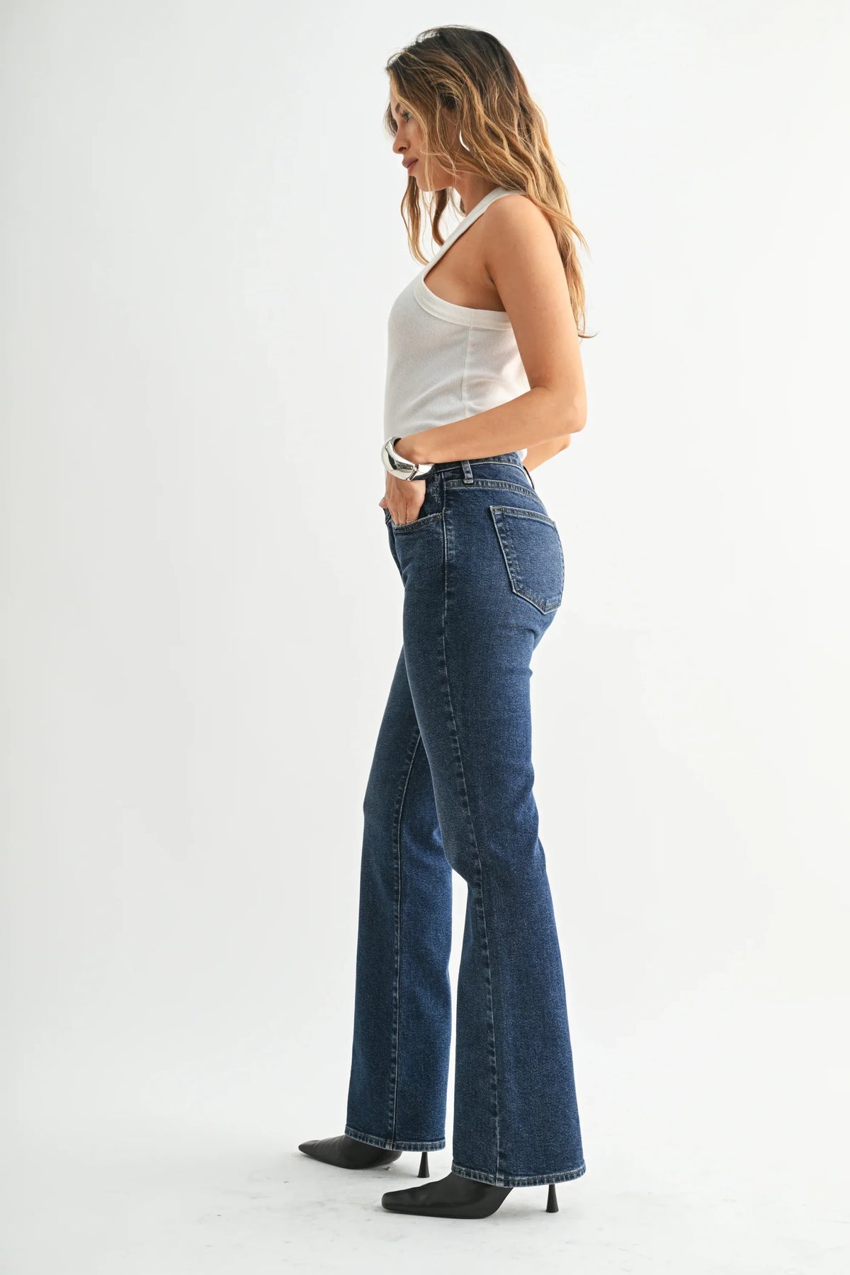 Women’s dark wash flare jeans from LOW RISE VINTAGE SLIM BOOTCUT DENIM collection