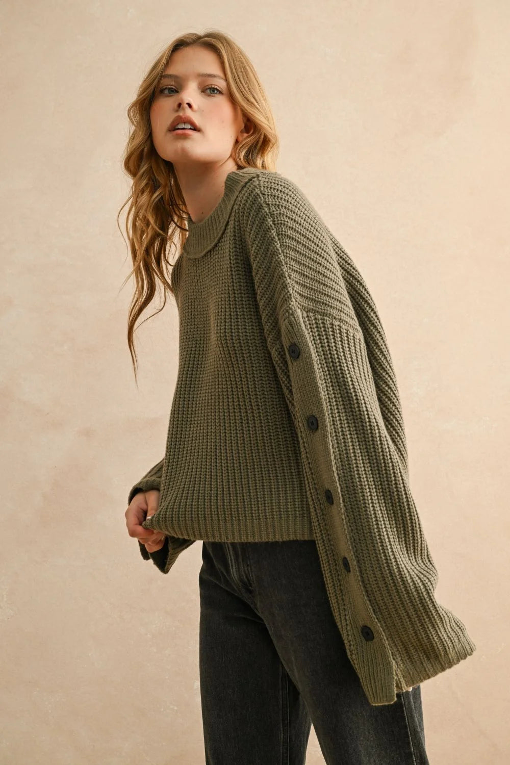 Women’s olive green long sleeve sweater with wide neck long design and side buttons