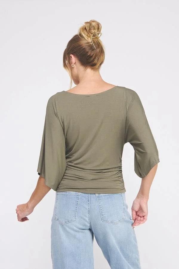 Women’s olive green double knit angel sleeve top with ruched sides and angel sleeve cinch