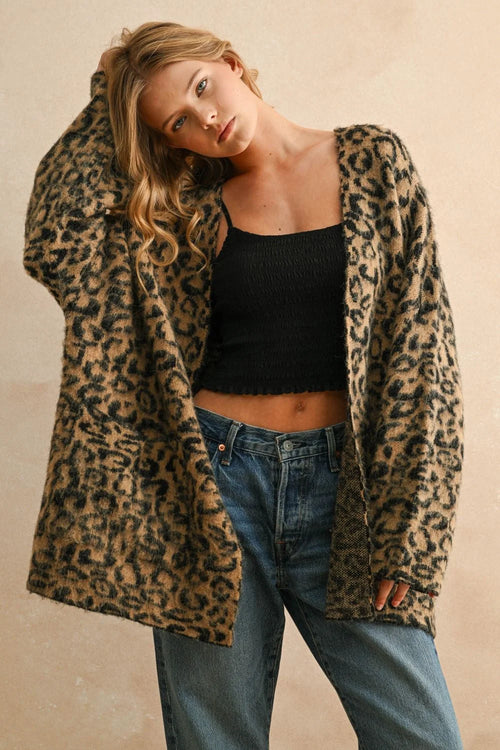 Women wearing a stylish leopard oversized cardigan from the LEOPARD OVERSIZED CARDIGAN collection