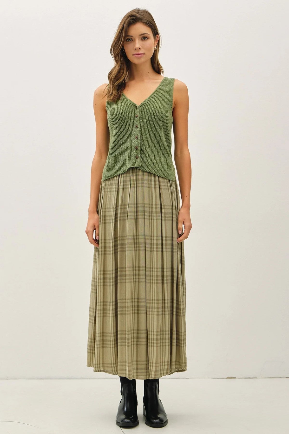 Women’s sleeveless olive green v-neck ribbed knit top with plaid printed pleats midi skirt