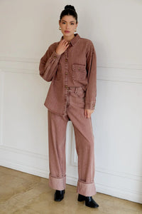 Women’s striped long-sleeve button-up shirt with matching wide leg strip denim pants