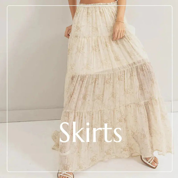 Long flowy tiered maxi skirt in light beige from the Chic Bohemian Maxi Skirts collection