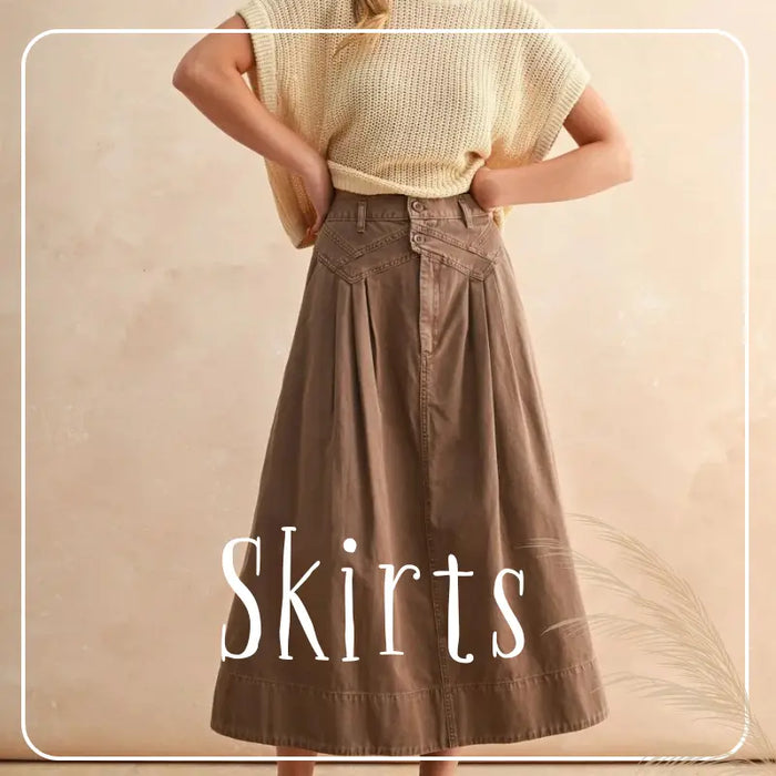 Long flowy tiered maxi skirt in light beige from the Chic Bohemian Maxi Skirts collection