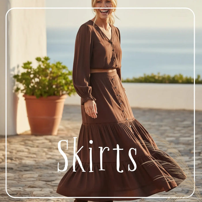 Long flowy tiered maxi skirt in light beige from the Chic Bohemian Maxi Skirts collection