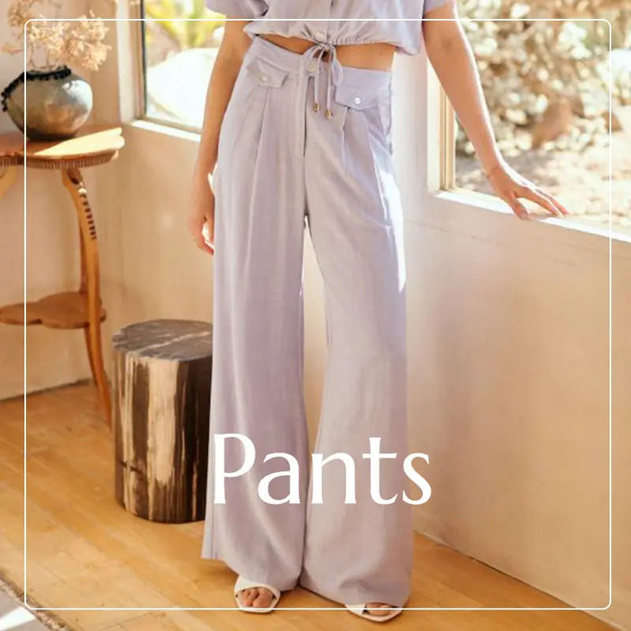 Light gray wide leg bohemian pants with drawstring and high waist in Shop All Pants collection.