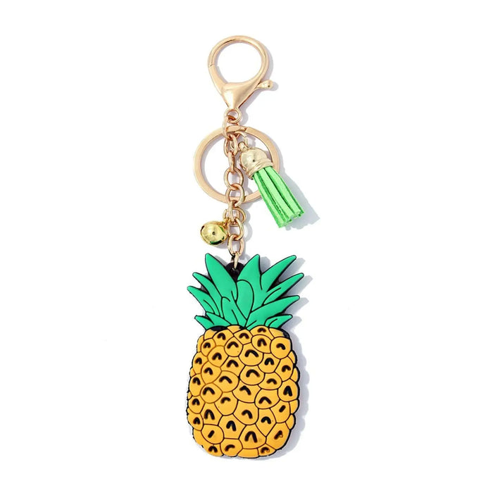 Pineapple-shaped keychain charm with green leaves and yellow body in Daisy Lane collection.