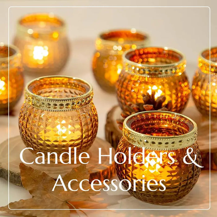 Glowing amber glass candle holders create a beautiful ambiance in Candle Holders & Accessories.