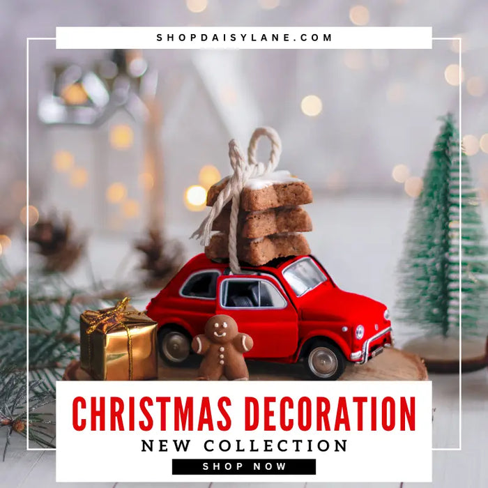 Red vintage car Christmas ornament with gingerbread man and cookies on roof.