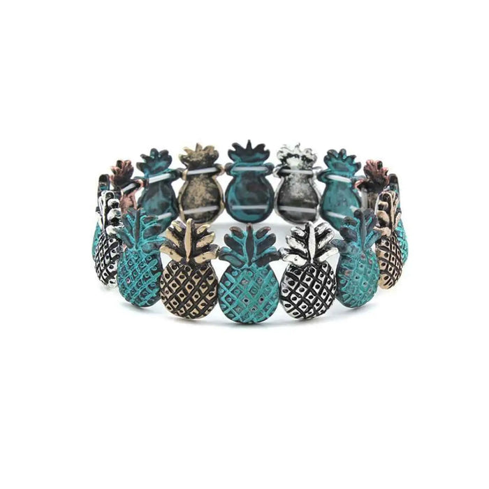 Pineapple-shaped bracelet with turquoise and silver charms from Daisy Lane Boho collection.