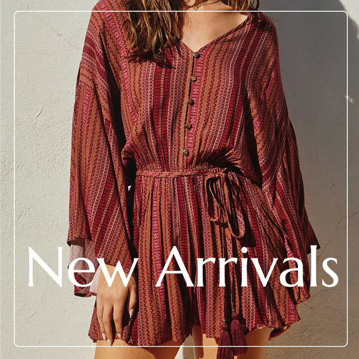 Burgundy striped long-sleeved romper with belted waist from Daisy Lane’s latest trends.