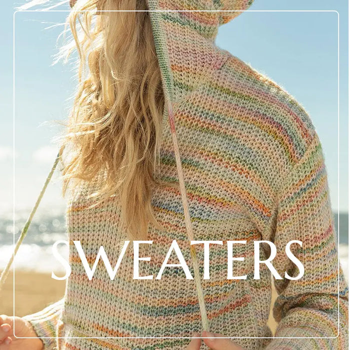 Knitted pastel-striped sweater worn by a person with long blonde hair from Daisy Lane.