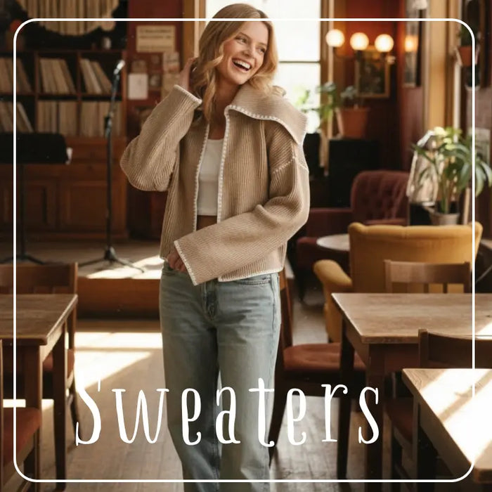 Knitted pastel-striped sweater worn by a person with long blonde hair from Daisy Lane.