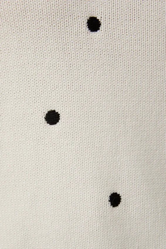 Puff short sleeve polka dot sweater with white fabric and black embroidered dots