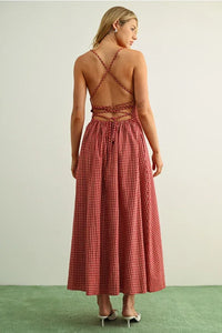 Back view of gingham pattern open back maxi dress with braided straps