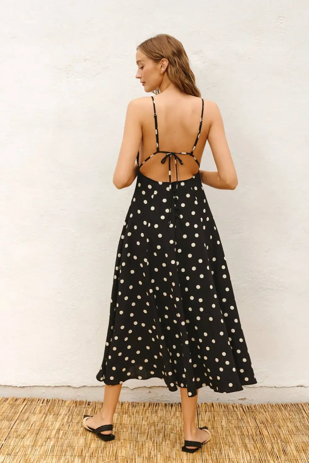 Black polka dot midi dress with spaghetti straps for Valentine’s Day
