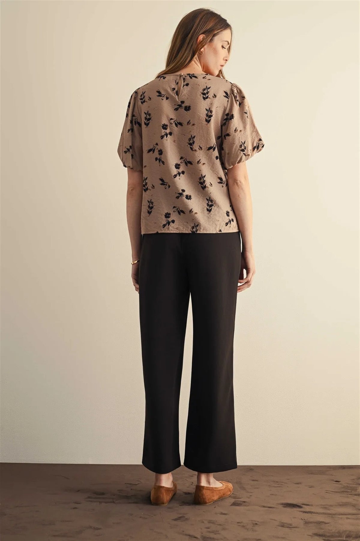 Beige flower print balloon sleeve blouse with delicate black floral pattern and short puffed sleeves
